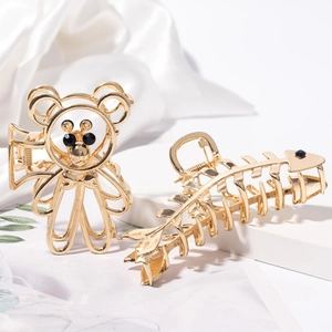 Haarklammern aus Goldmetall im Bären- und Fischgräten-Design mit glänzendem Finish