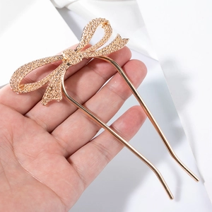 Épingle à cheveux dorée avec nœud en strass brillants pour coiffures élégantes