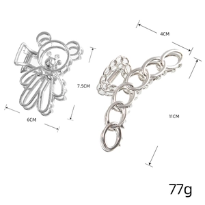 Elegant silver metal hair claws featuring hollow bear and chain link designs for styling