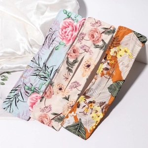 Three-piece floral print deft bun maker set with elegant rose and leaf patterns