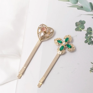 Exquisite gold alloy hair clip set with heart rhinestones and star pearl accents