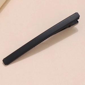 Barrette à cheveux noir mat minimaliste avec conception à bord dentelé antidérapant