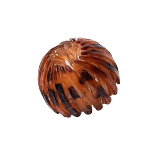 Expandable bird nest hair ring in amber tortoise pattern for ponytail bun hairstyles