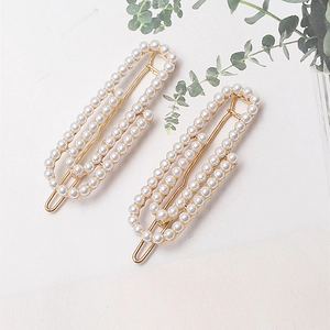 Elegant gold clip set with white faux pearls in rectangular minimalist French style