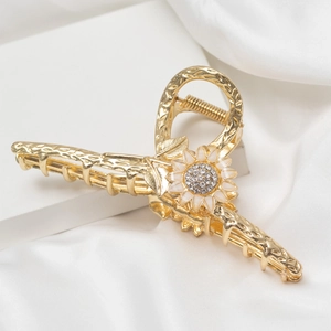 Elegante molletta per capelli a girasole dorata con smalto bianco e strass