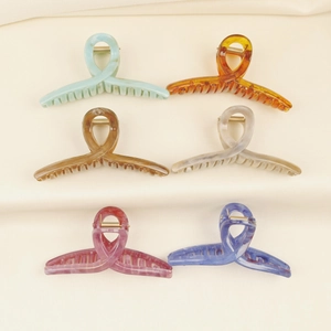 Large matte marble acetate hair claws set in six assorted colors for elegant hairstyling