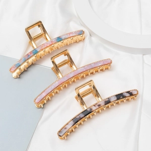 Three-piece set of elegant marble texture claw clips with golden metal bases