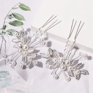 Elegante silberne Braut-Haarnadeln mit weißen Perlen und Blattdetails aus Metall