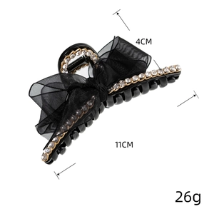 Pince à cheveux noire élégante avec nœud, strass et chaîne dorée, longueur 11 cm
