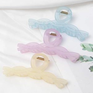 Three-piece matte hair claw clip set with woven design in blue, purple and beige