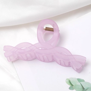 Matte purple twisted hair claw clip for women on white silk background styling