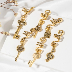 Set of 6 gold spiral dreadlock charms with vintage keys, locks and musical notes