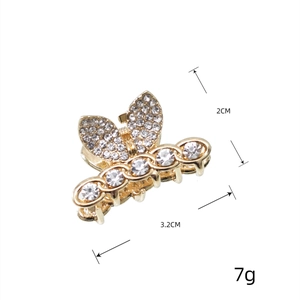 Pince à cheveux papillon dorée avec strass scintillants pour accessoire de coiffure féminin