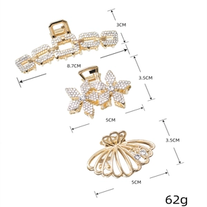 Lot de trois pinces à cheveux dorées en alliage ornées de strass brillants variés