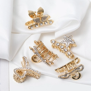 Lot de 5 mini pinces à cheveux dorées avec strass en forme d'étoile et de papillon