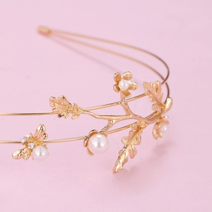 Elegant gold double-layered branch headband with pearls, metallic flowers and a bee detail