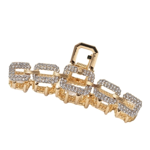 Pince à cheveux en métal doré avec design chaîne rectangulaire et strass brillants