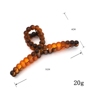 Brown matte frosted 11cm hair claw clip with round bead twist design for women