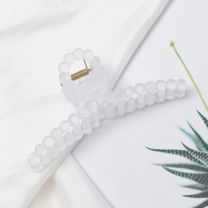 Frosted white bubble bead claw clip with gold spring for elegant hair styling