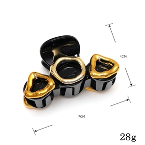 Elegante pinza per capelli nera e dorata da 7 cm con maglie per le donne