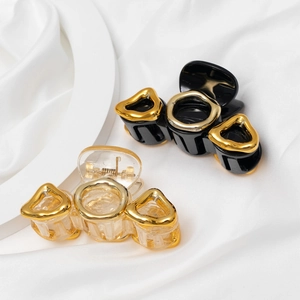 Elegante Pinza per Capelli a Cuore Traforato per Donna Accessorio per Capelli in Resina Plastica e Metallo Geometrico Irregolare di Moda