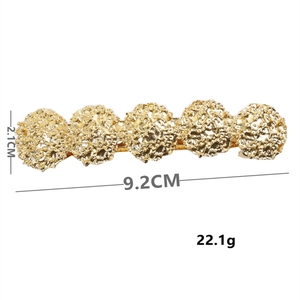 Elegant gold metal spring hair clip with five hollow round flower patterns for ponytails