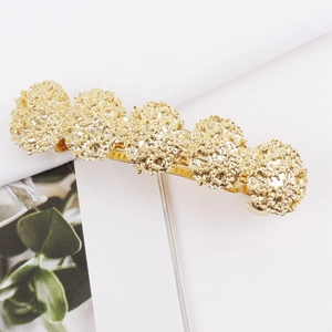 Elegant gold metal hair clip with irregular round lava texture for women ponytail