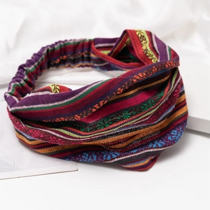 Bohemian striped knit wide headband for women featuring colorful ethnic patterns and twist