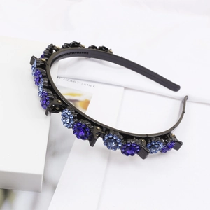 Detail of blue rhinestone sunflower headband with integrated hair clips for styling