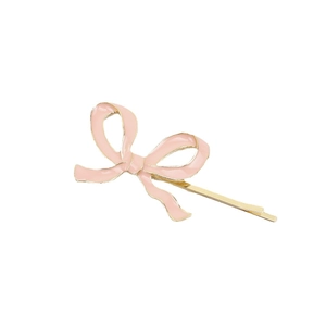 Barrette à cheveux avec nœud en émail rose et finition métallique dorée élégante
