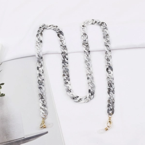 Leopard print acrylic eyewear chain with marble texture and golden lobster clasps