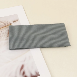 Detailed close-up of ribbed knit texture on the blue-gray elastic yoga sports headband