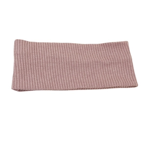 Knitted wide elastic yoga headband in soft lotus pink color on a clean white background