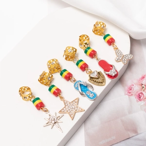 Golden dreadlock hair rings set with colorful beads and rhinestone star heart charms