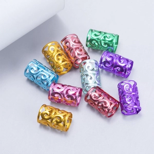 Detailed view of colorful hollow aluminum hair cuffs for dreadlock braiding accessories
