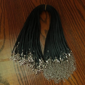 Detail of 60cm black wax rope necklaces with silver lobster clasps and extension chains