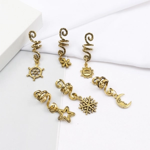 Antique gold spiral dreadlock cuffs with vintage alloy pendants like sun and moon charms