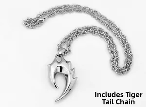 Detailed silver tribal claw pendant necklace featuring a polished tiger tail chain design