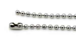 Close-up of a silver stainless steel ball chain with a cylindrical clasp connector