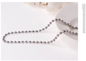 Detail shot of silver 304 stainless steel ball chain necklace with polished finish