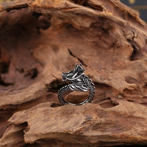Retro dragon open ring in antique silver finish with detailed scales on driftwood base