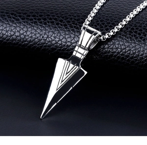 Detail view of Pharaoh's Spear arrowhead pendant with polished steel box chain