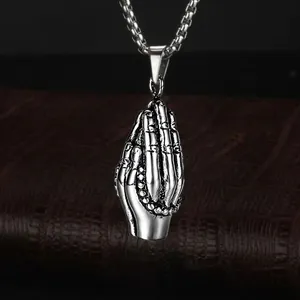 Vintage stainless steel praying hands pendant necklace with rosary beads on a box chain