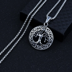 Close-up of Tree of Life pendant with Celtic knot edges on a silver box chain