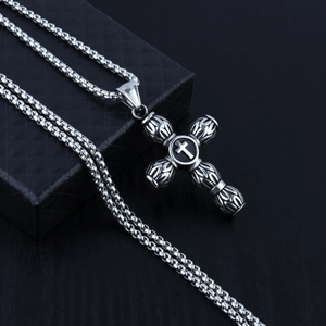 Retro vintage men's cross pendant necklace with embossed details on a ball chain