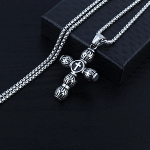 Retro stainless steel cross pendant necklace with vintage relief texture on a box chain