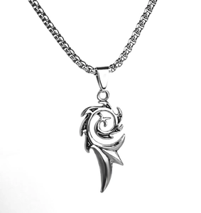 Detailed macro view of silver stainless steel flame spiral pendant on a thick round link chain