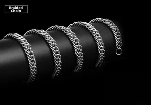 Macro view of heavy industrial curb chain necklace in silver stainless steel finish