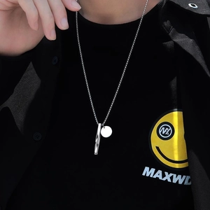 Minimalist silver stainless steel spiral pendant necklace for men worn on streetwear outfit