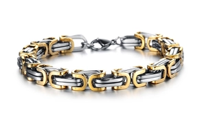 Detailed macro view of heavy two-tone stainless steel link chain bracelet for men